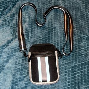 The original Haute Shore Casey Cellphone Crossbody bag in "Jazz" color.